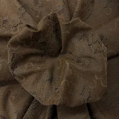 Elastic gabardine with layered lace effect